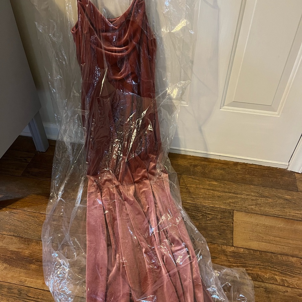 Floor length burnt orange bridesmaid/formal dress.